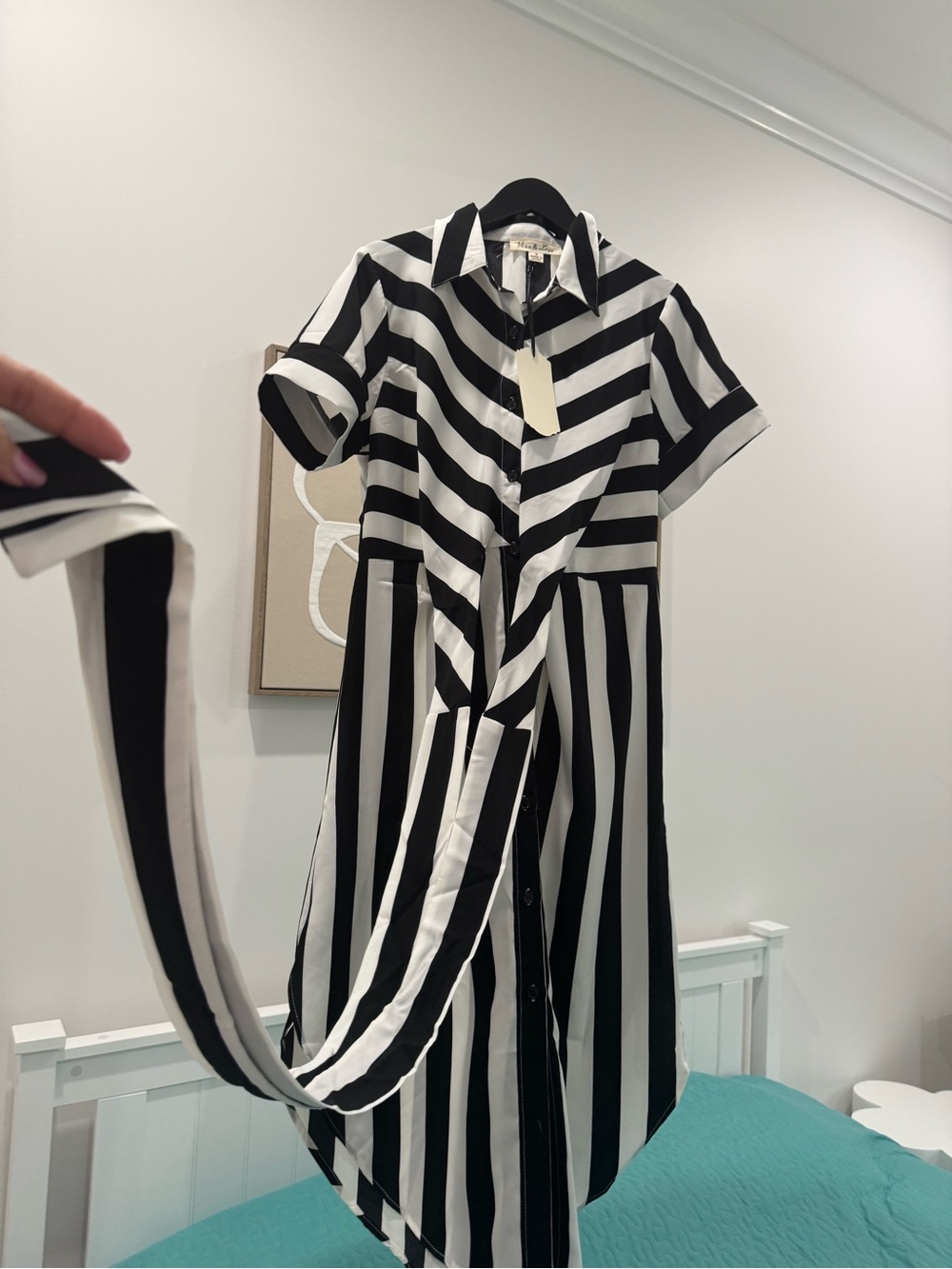 Vine & Love black and white striped maxi dress featuring a classic collar, short